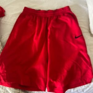 red nike shorts